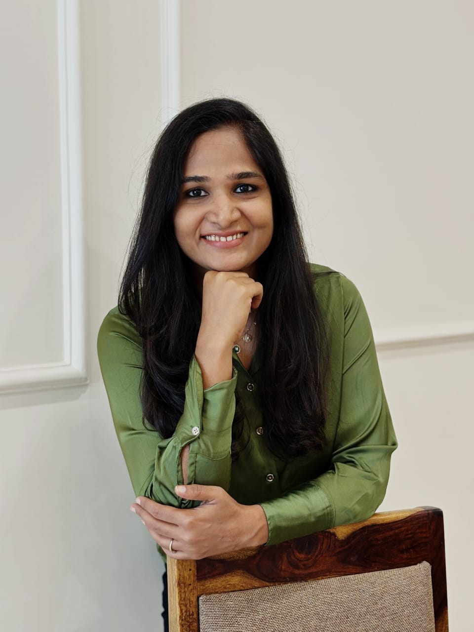 Geetika, ICF-PCC certified coach, standing with a warm smile
